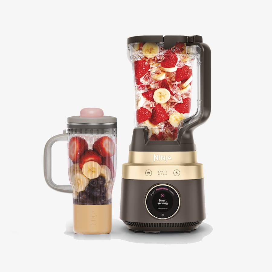 Exact LB301BR Mocha & Gold configuration: image shows the pitcher-only blender base and the included BlendBOSS tumbler; staged fruit is not package content.