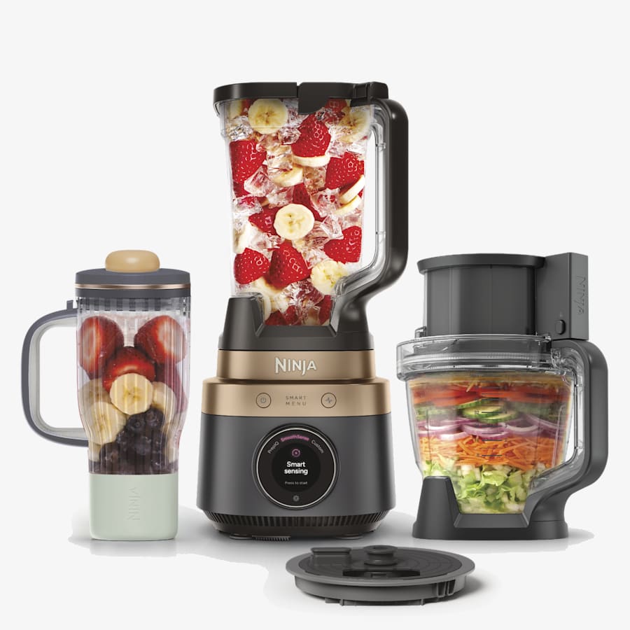 Black and Copper Ninja CrushBOSS LB451BK1 base with pitcher, tumbler and processor bowl; not all included parts are clearly pictured