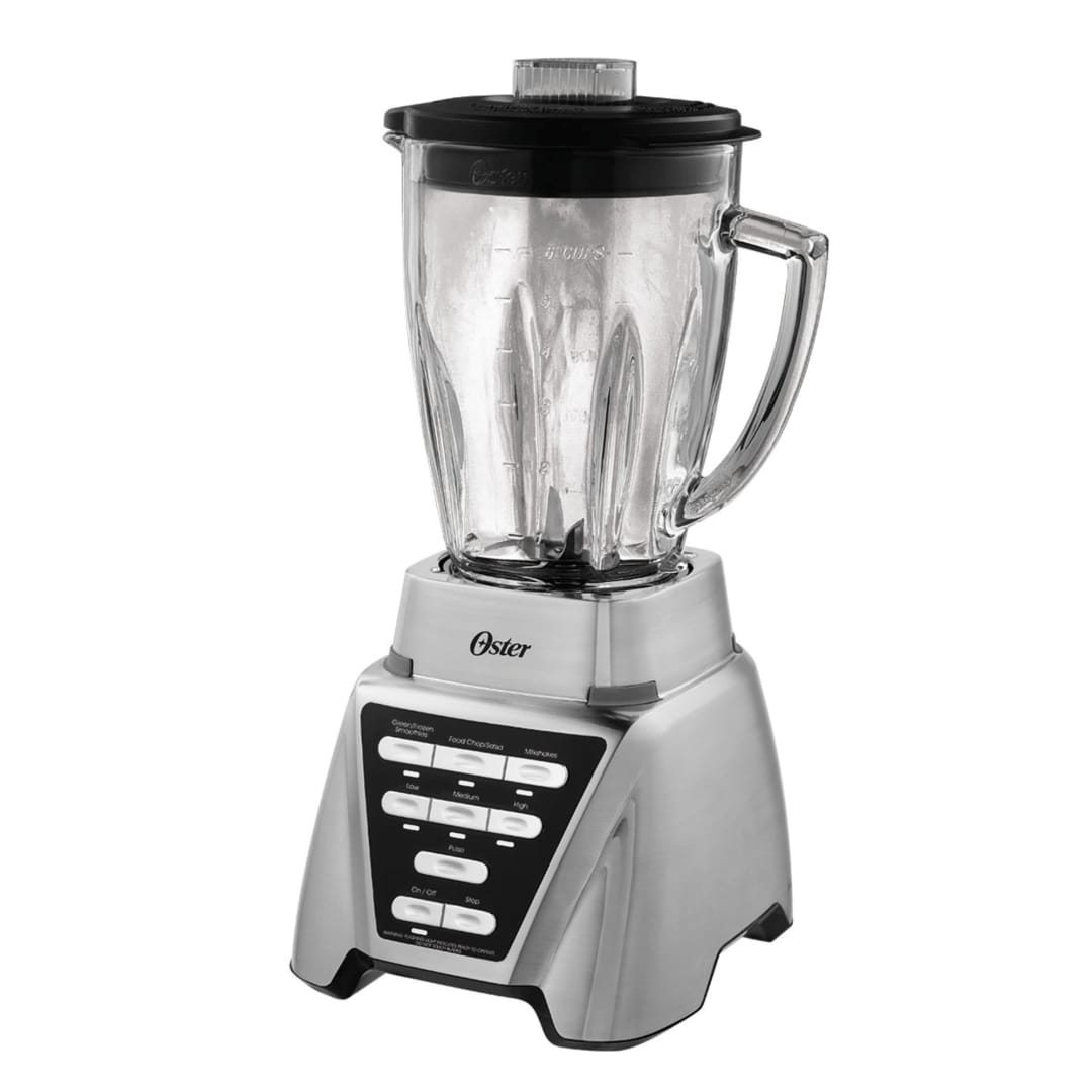 Brushed-nickel-color Oster Pro 1200 base with a six-cup glass pitcher and lid; separate Blend-N-Go cup is not shown